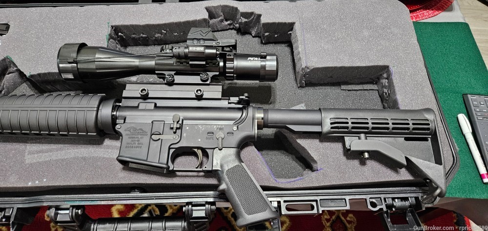 AR-15 Sold as a complete package that includes the hard-sided case-img-4