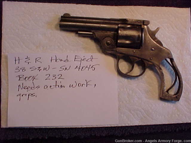 Book# 232  H&R Hand Ejector 38 S&W Caliber -img-0