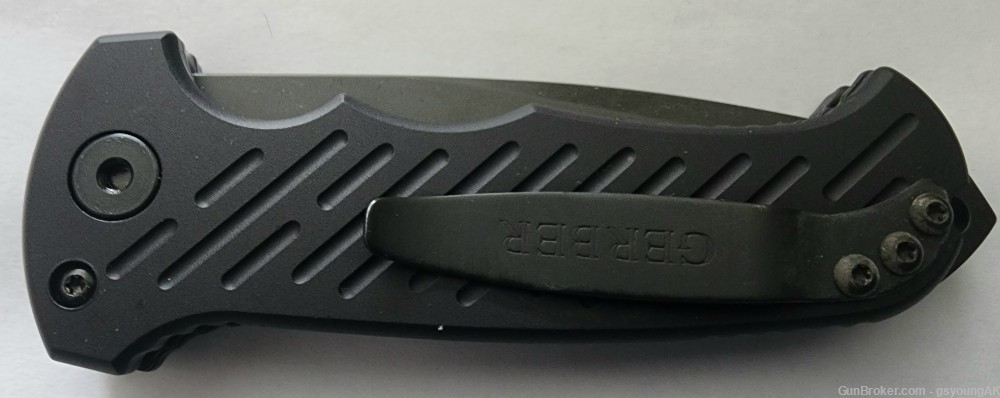 New Gerber 06 Drop point serrated auto. Made in USA.-img-3