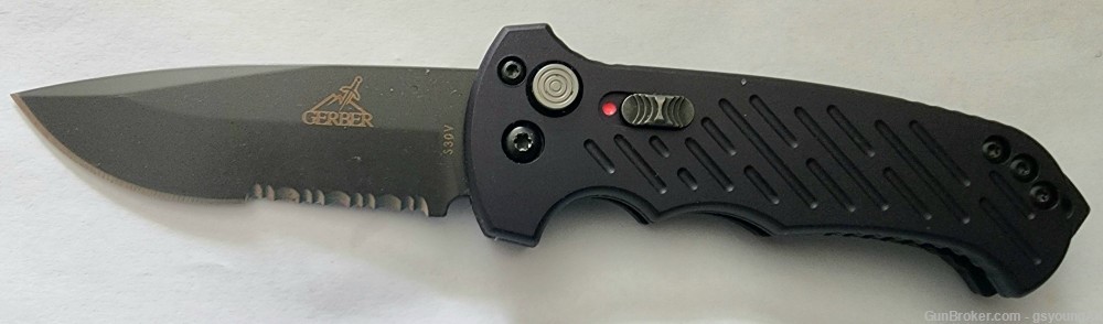 New Gerber 06 Drop point serrated auto. Made in USA.-img-0