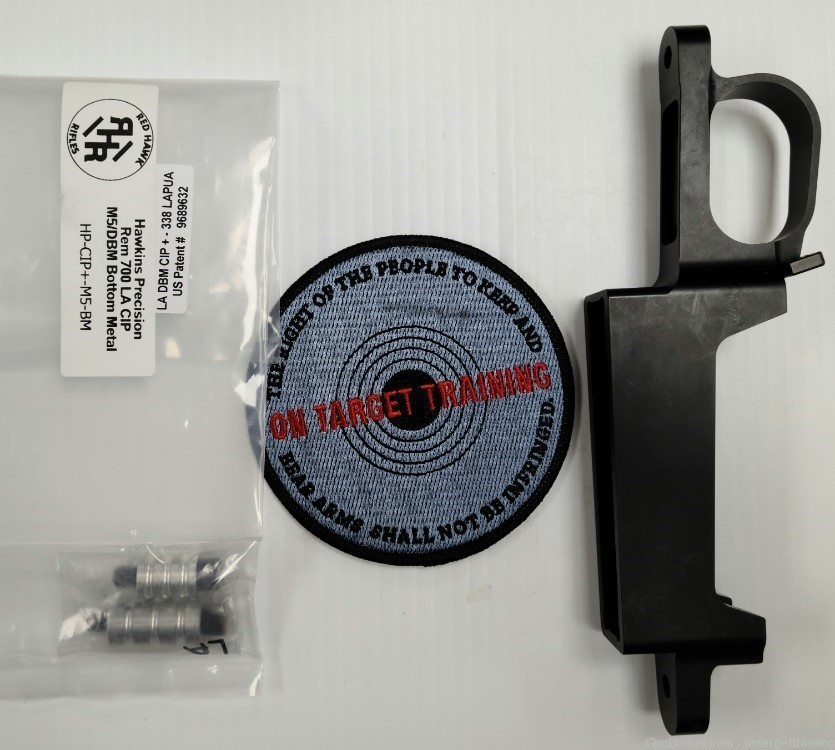 PRE-OWNED BUT UNUSED REM 700 LONG ACTION MAG & TRIGGER HOUSING IN 338 LAPUA-img-0