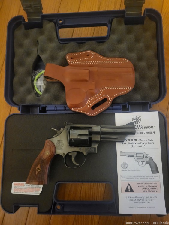 Model 27 in .357/.38 special, with leather thumb break holster -img-0