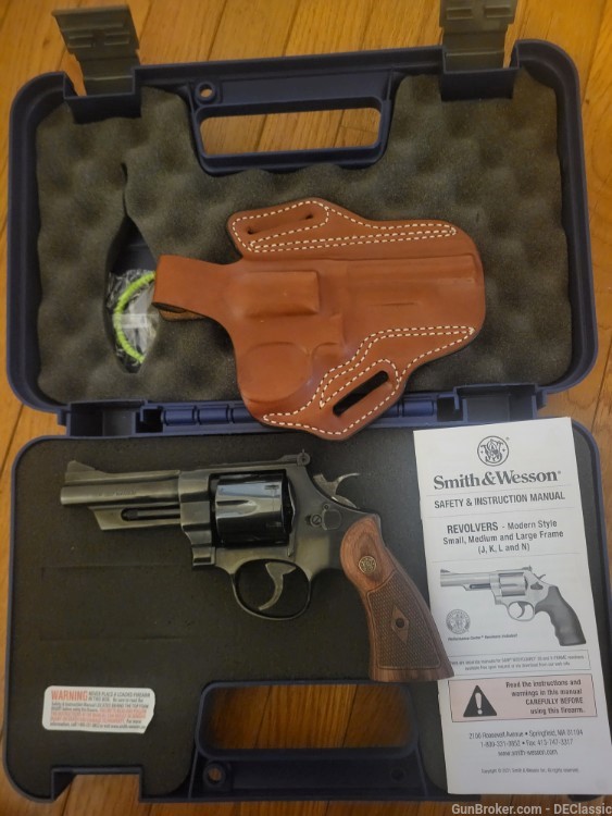 Model 27 in .357/.38 special, with leather thumb break holster -img-1