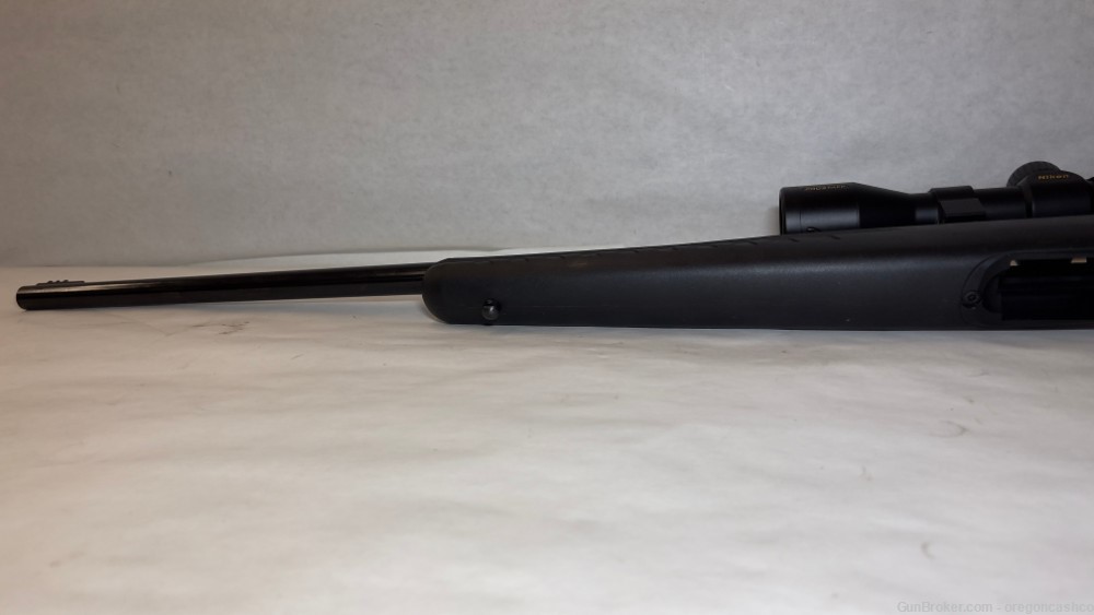 ruger american bolt action rifle. .22 Win Mag, Nikon Scope 2-7 iron sights-img-8