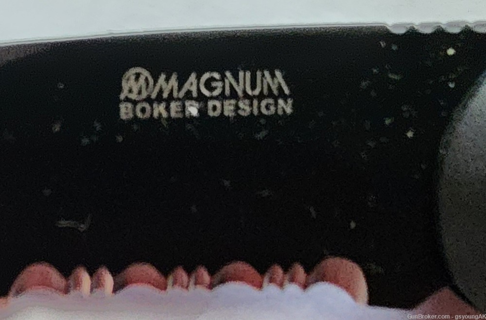New in box Boker Magnum B0017 auto opening, black, combination edge knife. -img-4