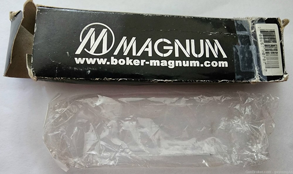New in box Boker Magnum B0017 auto opening, black, combination edge knife. -img-8