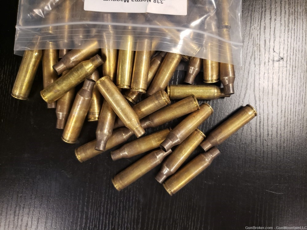  .338 Norma Magnum military, once fired, mixed headstamps, bag of 100  -img-0