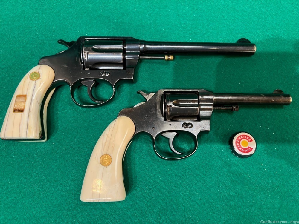 Pair of COLT Pistols in .32 w/ REAL Ivory grips and Mexican Gold coins -img-2