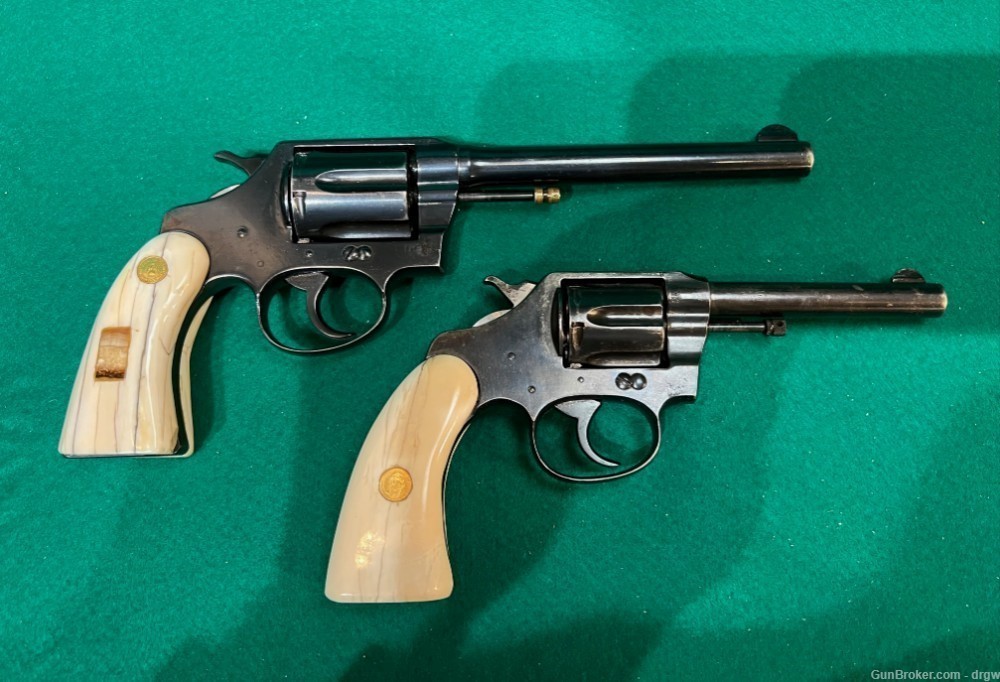 Pair of COLT Pistols in .32 w/ REAL Ivory grips and Mexican Gold coins -img-0