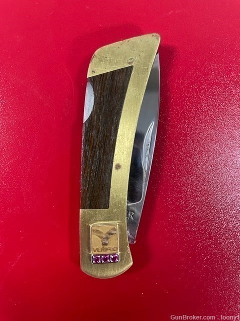 A Gerber 97223 folding lockback, wood with brass handle.  Marked "Veriflo"-img-3