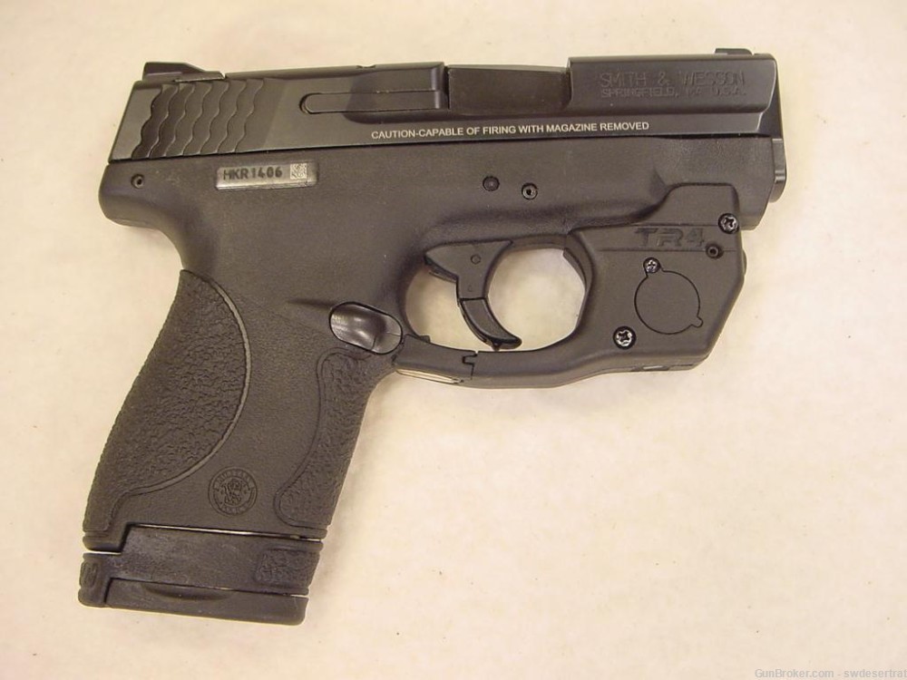 Smith & Wesson (S&W) M&P9 SHIELD 9mm +2 MAGS with ArmaLaser TR4 Green Laser-img-1