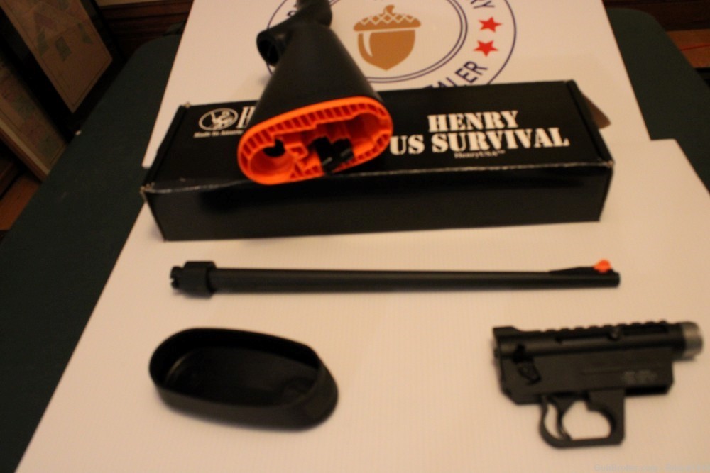Henry AR-7  NIB survival rifle all parts kept inside stock. Will float. -img-1