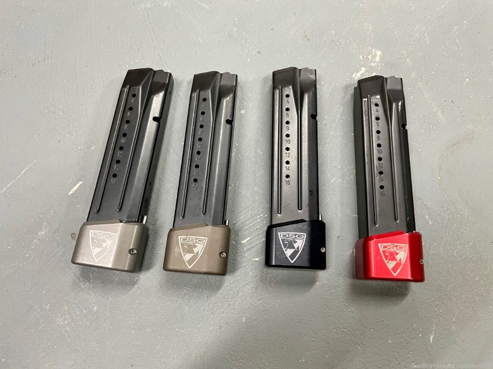 4 Smith and Wesson OEM M&P 9 17 Round Magazines with +5 Taran DSG Base Pads-img-0