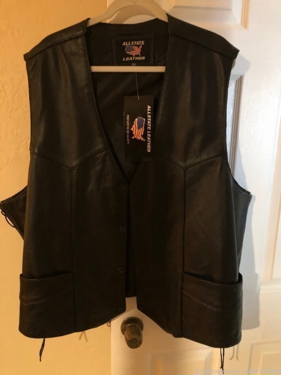 VEST BLACK LEATHER HAS A CONCEALMENT POCKETS FOR FIREARM CELL PHONE ETC.-img-0