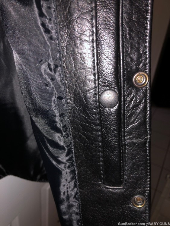 VEST BLACK LEATHER HAS A CONCEALMENT POCKETS FOR FIREARM CELL PHONE ETC.-img-3