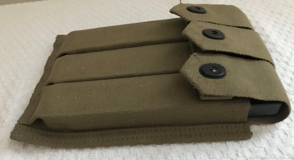 W.W. II. 3 Thompson U.S. 30 Round Magazines in U.S.M.C. Canvas Pouch-img-0