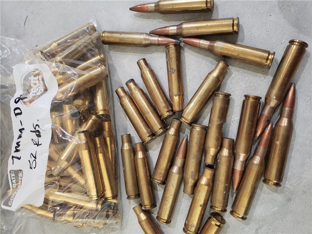 7mm-08 reloading brass and 10 bullets-img-0