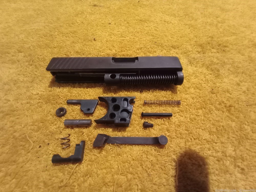 Intratec cat9 9mm pistol repair parts kit all here less frame-img-0