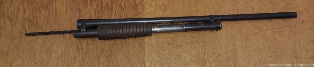 Winchester Model 12 16 ga 24" barrel w/ magazine entire front half-img-0