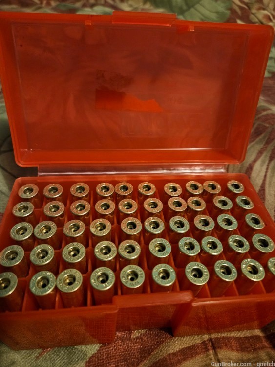 50 -225 Winchester sized, fired cases and plastic box-img-0