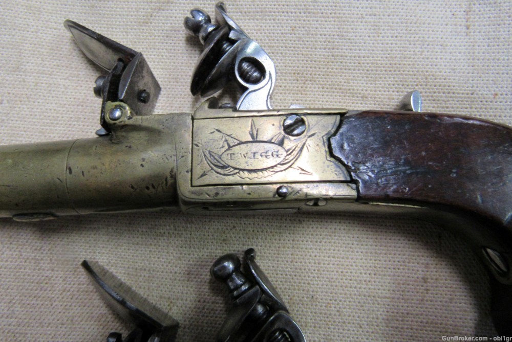Cased Set of Twigg English Boxlock Brass Flint Muff Pistols ca. 1820-img-14