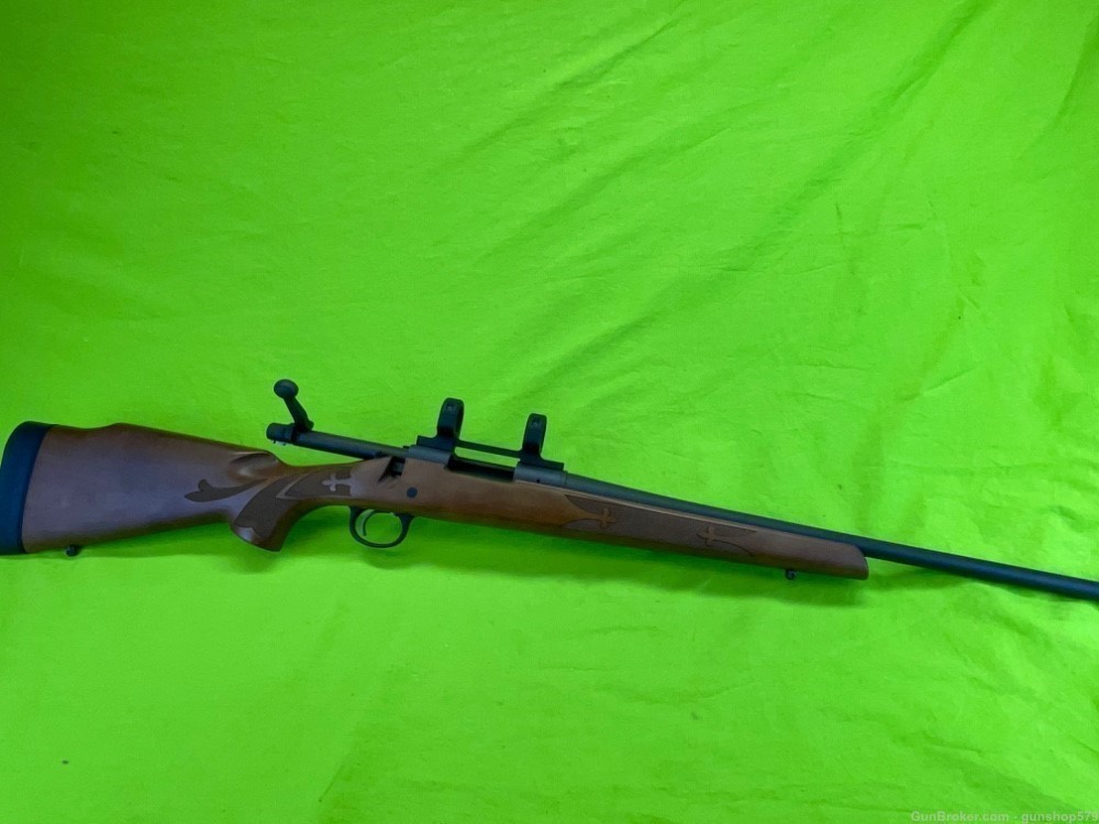 Remington 700 ADL 243 Winchester Matte Blue Hardwood DNZ Mount Bolt Action -img-0