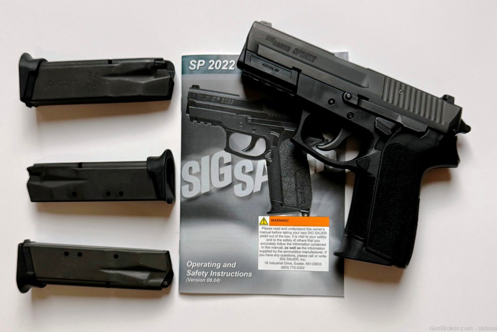 Sig Sauer SP2022 40 S&W 3.9" Barrel with 4 SigSauer Magazines and Orig Box-img-1