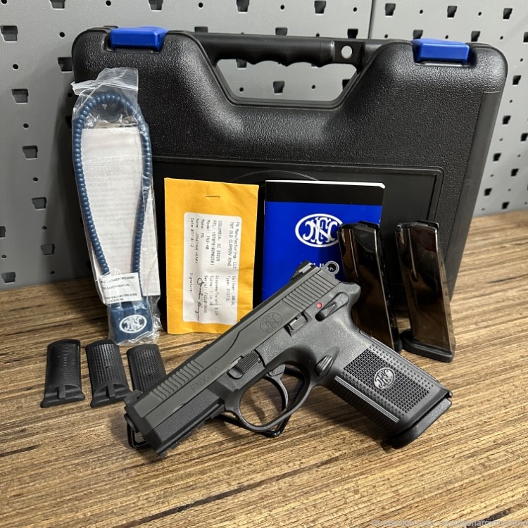 FN FNX-40 .40 S&W 4" 14rd w/ Box + Manuals MINT CONDITION! Penny Auction!-img-0