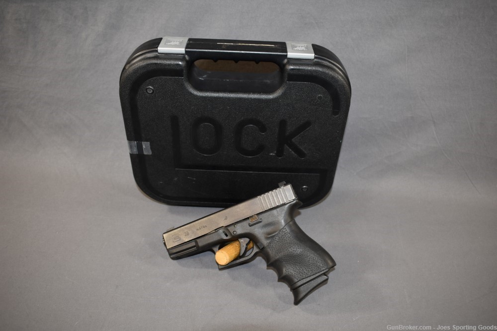 Glock 23 - .40 S&W Semi-Automatic Pistol w/ Factory Case & Hogue Grip-img-0