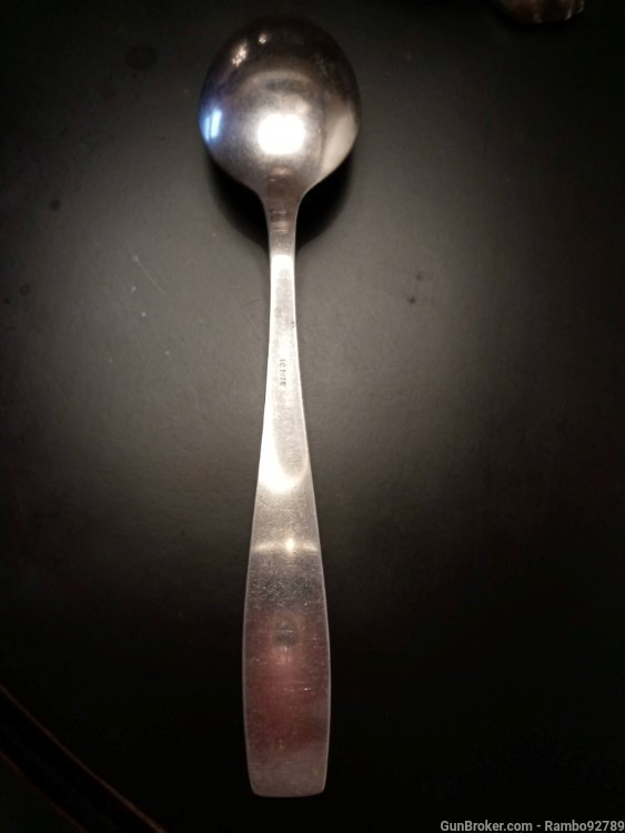 Adolf 's personally owned "A.H. formal pattern" silver dinner spoon.-img-1