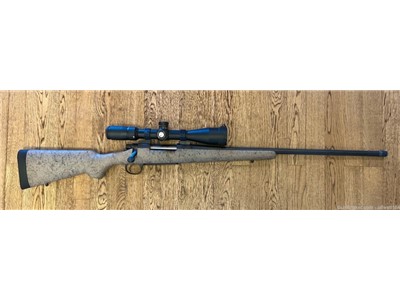 Remington model 700 25-06 threaded fluted barrel, spiderweb stock,  scope