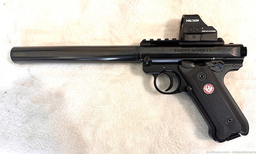 Suppressed slant grip Ruger Mark 4 with universal suppressor and green dot-img-1