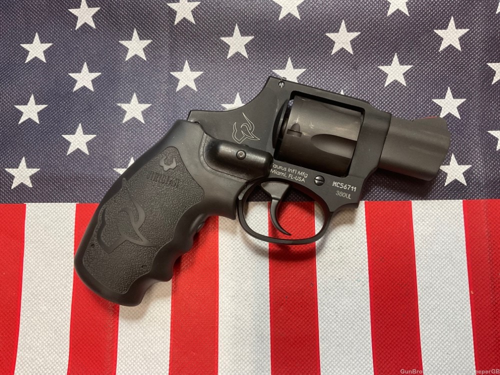 Taurus 380 UL 5-shot DAO revolver w/laser grips and OWB RH Fobus holster -img-1