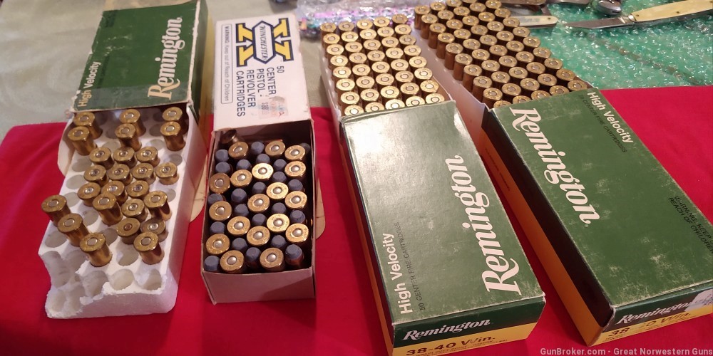 156x rounds & 13 reloadable brass in 4 boxes of 38-40 -img-0
