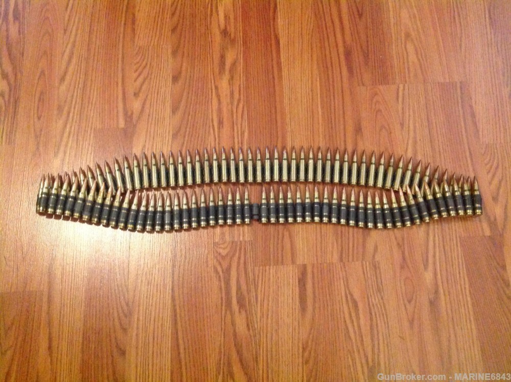 308  cal - linked belt  of  100 inert  dummy  ammo-img-0