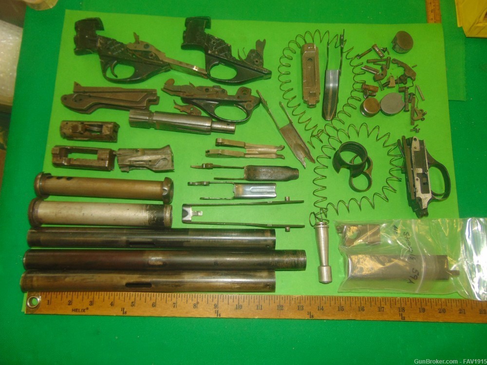 Gunsmith's lot of assorted shotgun parts-img-0