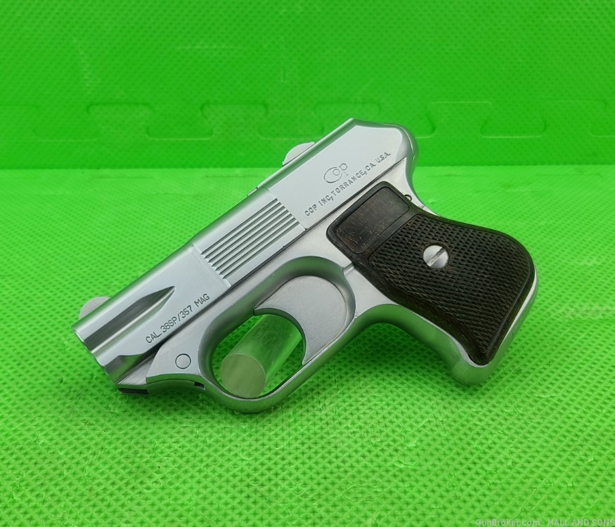 COP * COMPACT OFF-DUTY POLICE 357 Mag * 4-BARREL DERRINGER DISCONTINUED-img-0