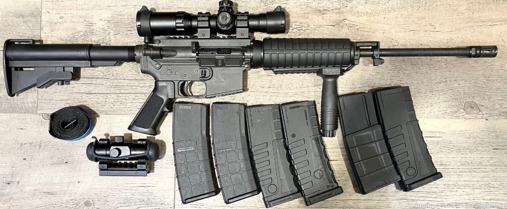 Bushmaster Carbon-15 .223 REM/5.56mm 16” + 6 Mags, Scope & Red Dot -img-0