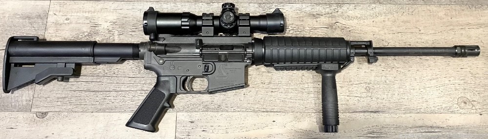 Bushmaster Carbon-15 .223 REM/5.56mm 16” + 6 Mags, Scope & Red Dot -img-1