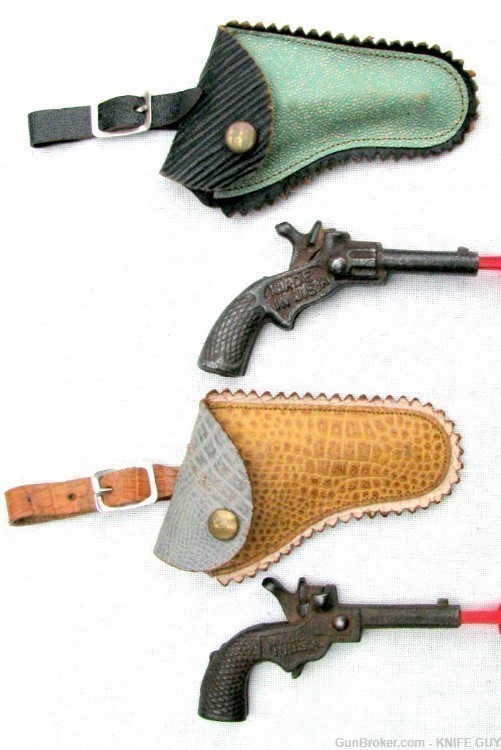 2 DIFFERENT SMALL TOY AMERICAN 1930s SINGLE SHOT CAP PISTOLS FANCY HOLSTERS-img-0