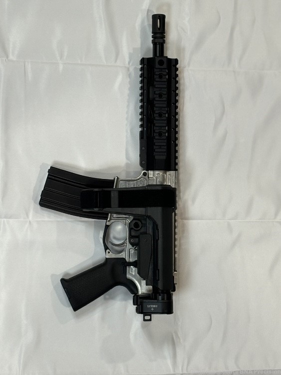 light weight pistol folding brace chambered in 5.56-img-2
