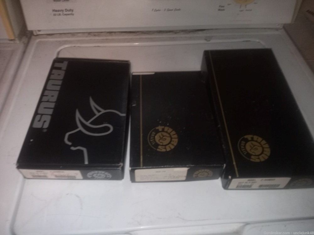3 taurus boxes with papers -img-1