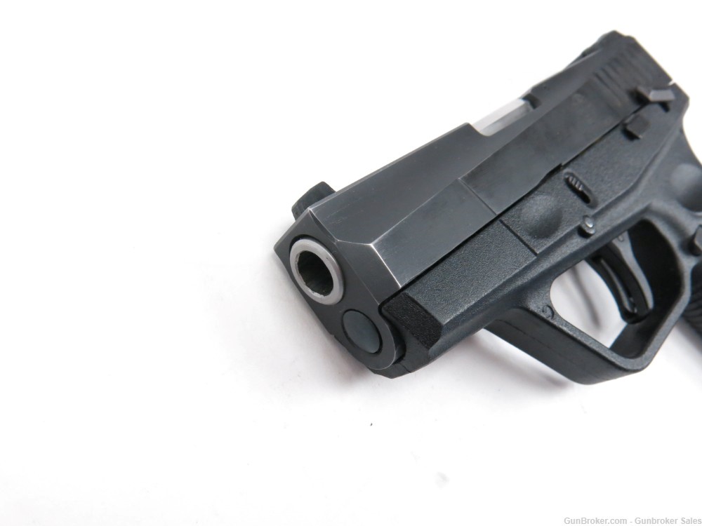 Taurus PT-709 Slim 9mm 3.25" Semi-Automatic Pistol w/ 3 Magazines-img-1