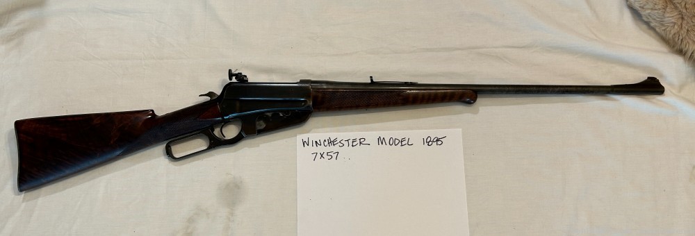 Winchester Model 1895 7x57 Caliber Lever Action rifle with Redfield Sight-img-0