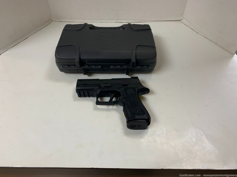 Sig Sauer P320 9MM Pistol W/case and 2 mags and Holster-img-0