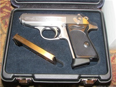  STAINLESS STEEL,WALTHER PPK IN .380, WITH HARD CASE TWO MAGS.