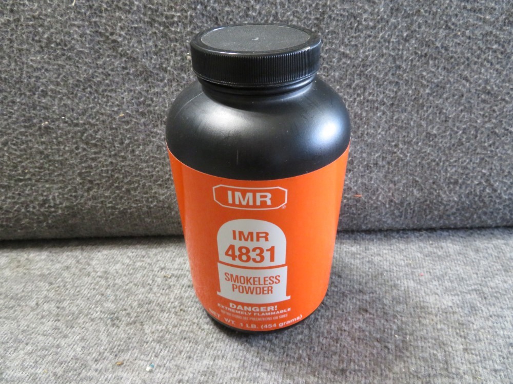 SEALED 1 POUND CONTAINER OF IMR 4831 SMOKELESS RELOADING POWDER-img-0