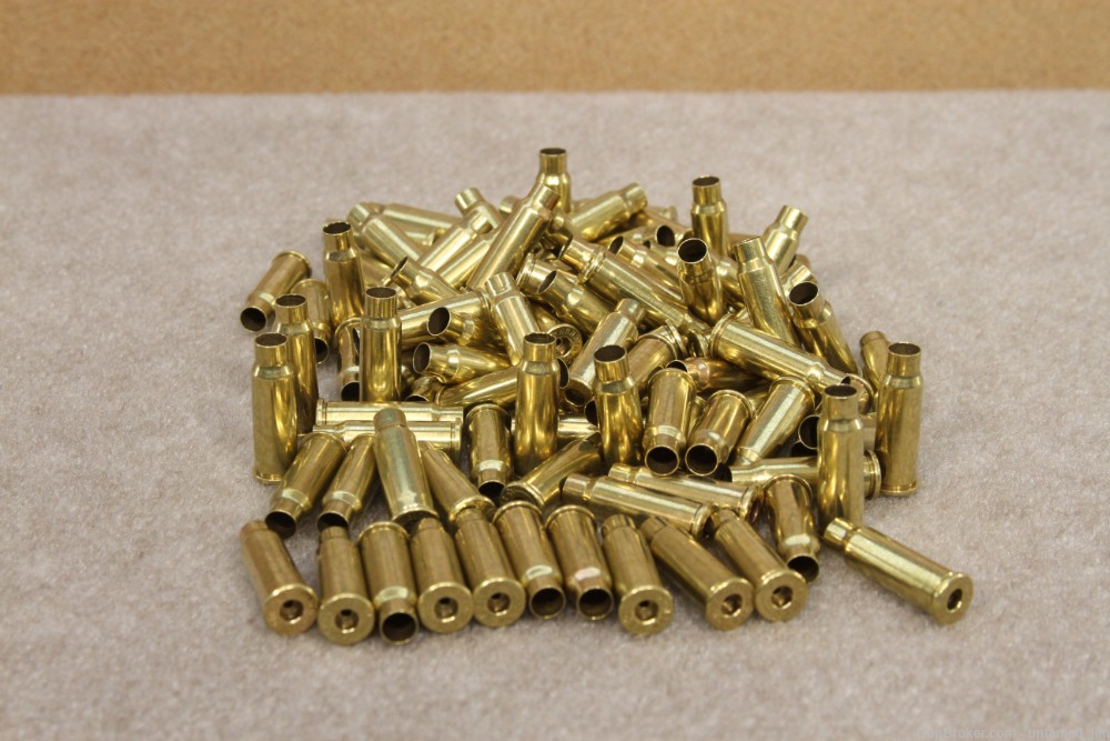 357/265  WIN MAG Formed BRASS MIXED HEAD STAMP 100ct.  -img-0