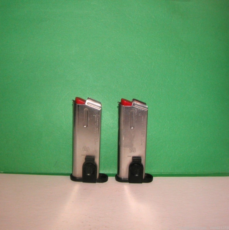 2 Factory Smith & Wesson SW9M 7rd SIGMA 9mm Magazines w/Clip-img-1