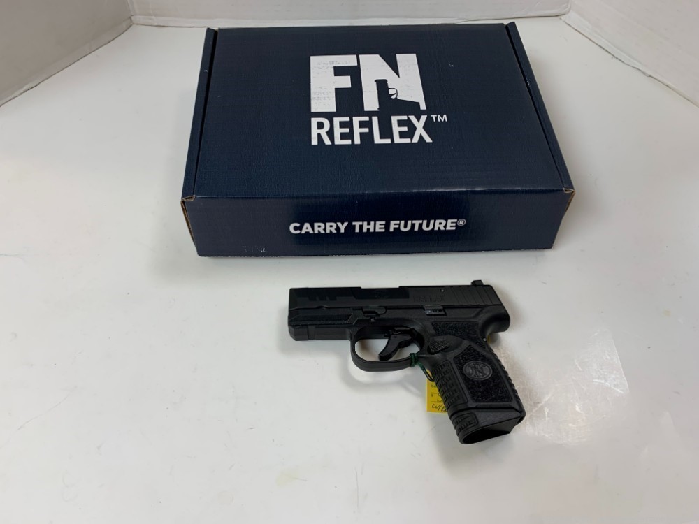 FN Reflex 9MM Pistol W/box and 2 Mags-img-0